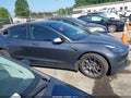 2021 Tesla Model 3 — photo 13 of 18 | VIN 5YJ3E1EB5MF049314
