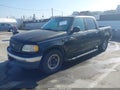 2001 Ford F-150 — photo 2 of 16 | VIN 1FTRW07L61KB39058