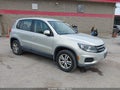 2013 Volkswagen Tiguan — photo 1 of 16 | VIN WVGBV3AX1DW588142