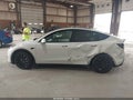 2021 Tesla Model Y — photo 14 of 19 | VIN 5YJYGDEFXMF178587
