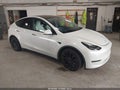 2021 Tesla Model Y — photo 1 of 19 | VIN 5YJYGDEFXMF178587