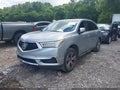 2017 Acura MDX — photo 2 of 16 | VIN 5FRYD3H33HB010721
