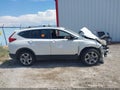 2017 Honda CR-V — photo 13 of 16 | VIN 2HKRW2H52HH636113