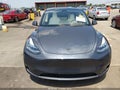 2023 Tesla Model Y — photo 11 of 17 | VIN 7SAYGDEE9PA157628