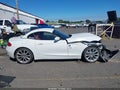 2013 BMW Z4 — photo 13 of 16 | VIN WBALM7C55DE385255