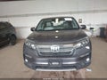 2020 Honda Pilot — photo 12 of 16 | VIN 5FNYF6H54LB069879
