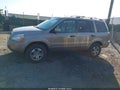 2004 Honda Pilot — photo 14 of 16 | VIN 2HKYF18544H622715