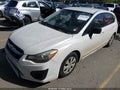 2014 Subaru Impreza — photo 2 of 12 | VIN JF1GPAA65E8339497