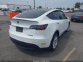 2022 Tesla Model Y — photo 4 of 18 | VIN 7SAYGDEE6NF347242