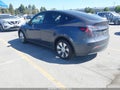 2023 Tesla Model Y — photo 3 of 15 | VIN 7SAYGDEEXPF748862