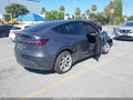 2023 Tesla Model Y — photo 4 of 15 | VIN 7SAYGDEEXPF748862