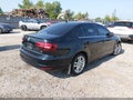 2016 Volkswagen Jetta — photo 4 of 16 | VIN 3VWL17AJXGM408133