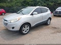 2011 Hyundai Tucson — photo 2 of 11 | VIN KM8JUCAC0BU205005