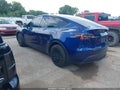 2023 Tesla Model Y — photo 3 of 20 | VIN 7SAYGDEE7PA088003