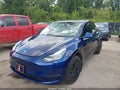 2023 Tesla Model Y — photo 6 of 20 | VIN 7SAYGDEE7PA088003