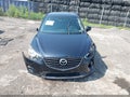 2016 Mazda CX-5 — photo 13 of 17 | VIN JM3KE4BY7G0619605