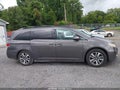 2014 Honda Odyssey — photo 14 of 17 | VIN 5FNRL5H95EB105057