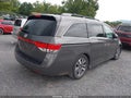 2014 Honda Odyssey — photo 4 of 17 | VIN 5FNRL5H95EB105057