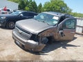 2011 Chevrolet Tahoe — photo 2 of 16 | VIN 1GNSCBE00BR398790