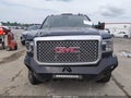2016 GMC Sierra — photo 12 of 16 | VIN 1GT12UE8XGF230124
