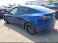 2023 Tesla Model Y — photo 3 of 20 | VIN 7SAYGDEF0PF965409