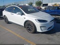 2023 Tesla Model X — photo 1 of 18 | VIN 7SAXCBE59PF411630