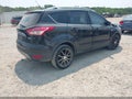 2014 Ford Escape — photo 4 of 17 | VIN 1FMCU9J97EUA59612
