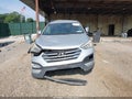 2013 Hyundai Santa Fe — photo 12 of 16 | VIN 5XYZUDLB1DG038837