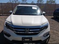 2017 Honda Pilot — photo 12 of 16 | VIN 5FNYF6H99HB069631