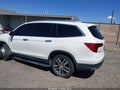 2017 Honda Pilot — photo 14 of 16 | VIN 5FNYF6H99HB069631