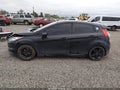 2015 Ford Fiesta — photo 14 of 16 | VIN 3FADP4GXXFM162091