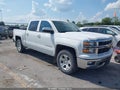 2015 Chevrolet Silverado 1500 — photo 1 of 19 | VIN 3GCUKREC1FG490553