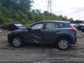 2013 Mazda CX-5 — photo 14 of 16 | VIN JM3KE4BE9D0119883