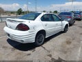 2002 Pontiac Grand Am — photo 4 of 16 | VIN 1G2NF52F72C112352