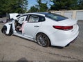 2016 Kia Optima — photo 3 of 15 | VIN 5XXGV4L21GG108348