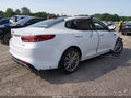 2016 Kia Optima — photo 4 of 15 | VIN 5XXGV4L21GG108348