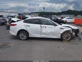 2018 Kia Optima — photo 14 of 17 | VIN 5XXGT4L32JG259303