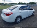 2014 Toyota Corolla — photo 4 of 18 | VIN 5YFBURHEXEP118474