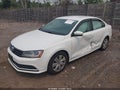 2017 Volkswagen Jetta — photo 2 of 12 | VIN 3VW2B7AJ2HM413904