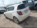 2015 Chevrolet Sonic — photo 3 of 15 | VIN 1G1JE6SB2F4123073