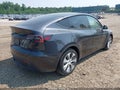 2024 Tesla Model Y — photo 4 of 16 | VIN 7SAYGDED9RF038152