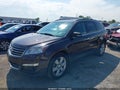 2016 Chevrolet Traverse — photo 2 of 16 | VIN 1GNKRGKD2GJ309858