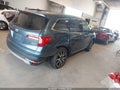 2022 Honda Pilot — photo 4 of 17 | VIN 5FNYF6H61NB024216