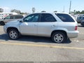 2004 Acura MDX — photo 14 of 17 | VIN 2HNYD18894H556603