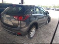 2014 Mazda CX-5 — photo 4 of 15 | VIN JM3KE2BE1E0318853