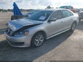2015 Volkswagen Passat — photo 2 of 12 | VIN 1VWAT7A34FC034475