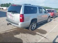 2013 Chevrolet Suburban — photo 4 of 16 | VIN 1GNSKJE7XDR164931