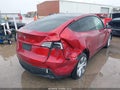 2024 Tesla Model Y — photo 4 of 20 | VIN 7SAYGAEE0RF086582