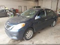 2014 Nissan Versa — photo 2 of 11 | VIN 3N1CN7AP8EL868585