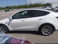 2023 Tesla Model Y — photo 14 of 18 | VIN 7SAYGDEE4PA145516